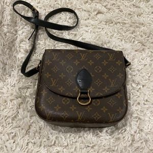 Louis Vuitton cross body bag.
